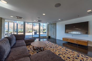 a living room with a couch and a television